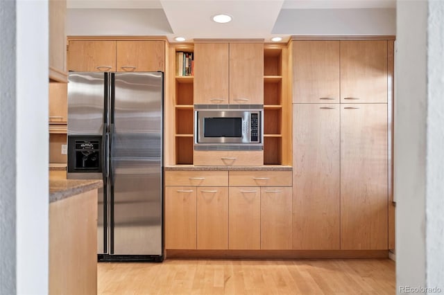 kitchen with light wood finished floors, recessed lighting, stainless steel appliances, and open shelves