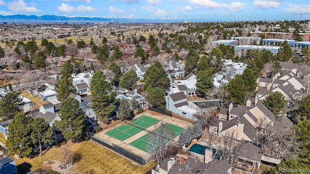 birds eye view of property featuring a mountain view and a residential view