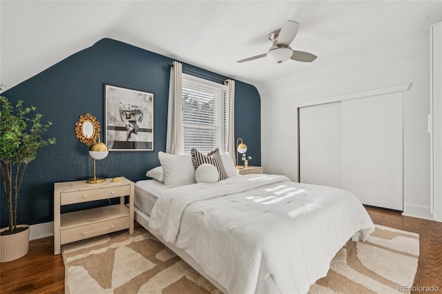 3881 Zenobia St, Denver, CO 80212 - bedroom featuring vaulted ceiling, wood finished floors, a closet, and ceiling fan