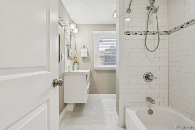 3881 Zenobia St, Denver, CO 80212 - full bathroom featuring marble finish flooring, vanity, and bathtub / shower combination