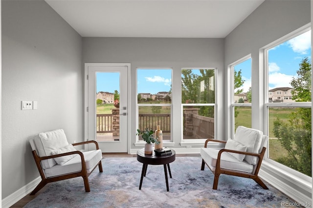 3041 Starling Ct, Castle Rock, CO 80109 - sunroom with baseboards and wood finished floors