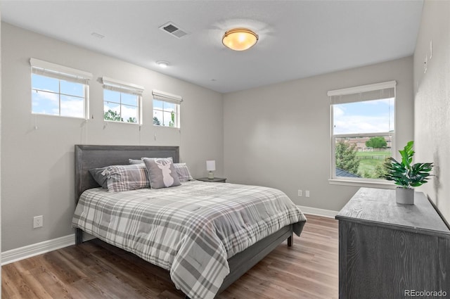 3041 Starling Ct, Castle Rock, CO 80109 - bedroom featuring baseboards and wood finished floors