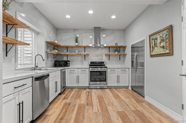 3041 Starling Ct, Castle Rock, CO 80109 - kitchen with open shelves, stainless steel appliances, a sink, wall chimney exhaust hood, and recessed lighting
