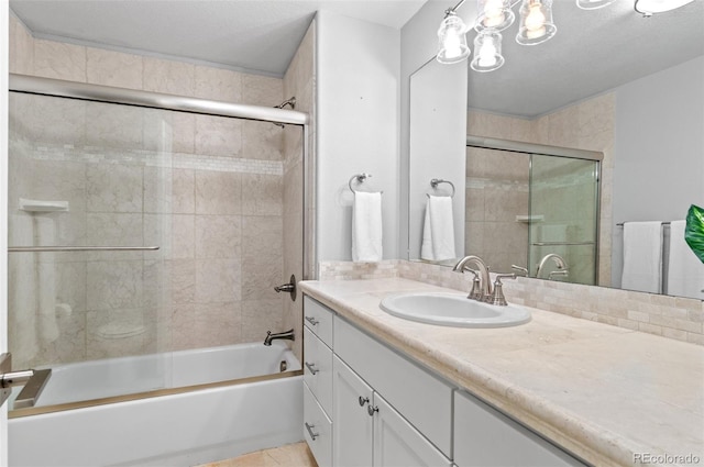 3041 Starling Ct, Castle Rock, CO 80109 - bathroom with vanity and bath / shower combo with glass door