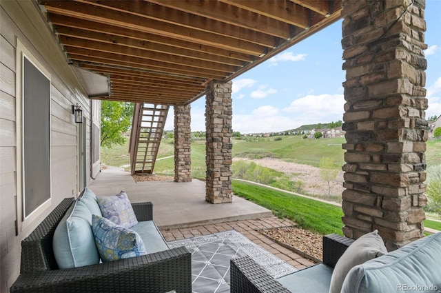 3041 Starling Ct, Castle Rock, CO 80109 - view of patio / terrace featuring an outdoor living space