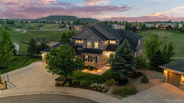 3041 Starling Ct, Castle Rock, CO 80109 - view of front of property featuring concrete driveway and stone siding