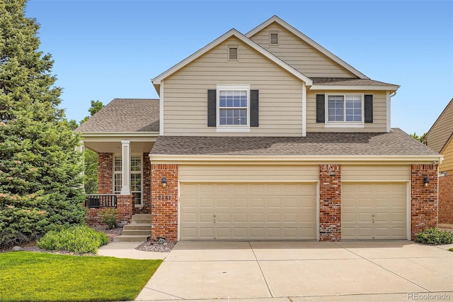 2561 Cactus Bluff Pl, Highlands Ranch, CO 80129 - view of front of home featuring brick siding, roof with shingles, an attached garage, and concrete driveway