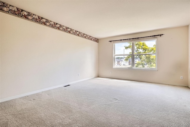 2561 Cactus Bluff Pl, Highlands Ranch, CO 80129 - carpeted spare room featuring baseboards