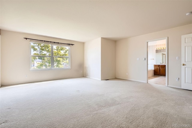 2561 Cactus Bluff Pl, Highlands Ranch, CO 80129 - empty room featuring light colored carpet and a smoke detector