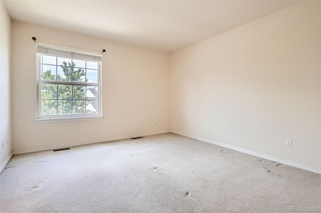 2561 Cactus Bluff Pl, Highlands Ranch, CO 80129 - carpeted spare room featuring baseboards