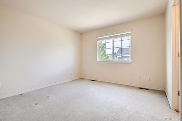 2561 Cactus Bluff Pl, Highlands Ranch, CO 80129 - unfurnished room with light colored carpet and baseboards