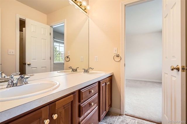 2561 Cactus Bluff Pl, Highlands Ranch, CO 80129 - full bath with double vanity and baseboards