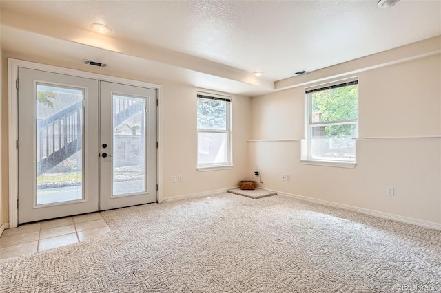 2561 Cactus Bluff Pl, Highlands Ranch, CO 80129 - carpeted empty room featuring french doors and baseboards