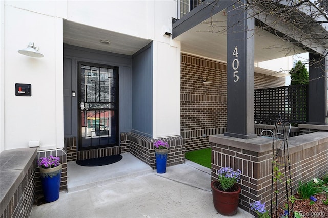 property entrance with covered porch