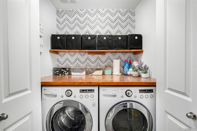 laundry room featuring separate washer and dryer