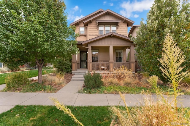 craftsman inspired home featuring covered porch