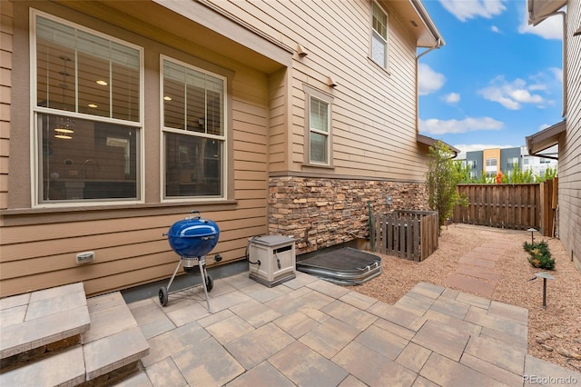 view of patio featuring a grill