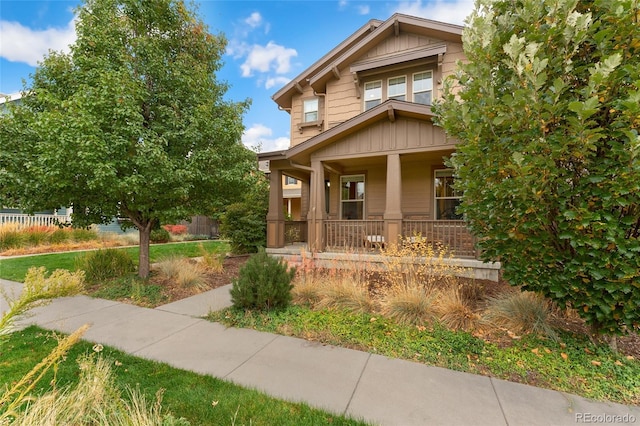 craftsman-style home with covered porch