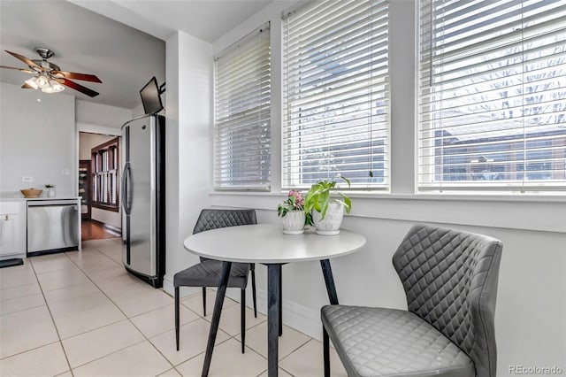 285 S Williams St, Denver, CO 80209 - dining space featuring a healthy amount of sunlight, light tile patterned floors, a ceiling fan, and breakfast area