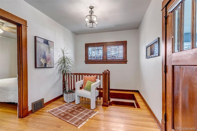 285 S Williams St, Denver, CO 80209 - interior space with visible vents, baseboards, a notable chandelier, and wood finished floors