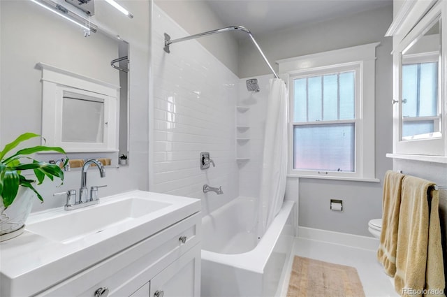 285 S Williams St, Denver, CO 80209 - bathroom featuring toilet, shower / bath combo with shower curtain, and vanity
