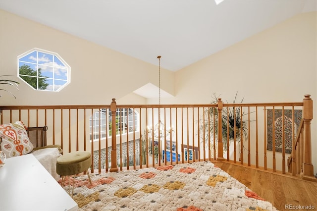 18489 E Columbia Cir, Aurora, CO 80013 - living area featuring wood finished floors and lofted ceiling