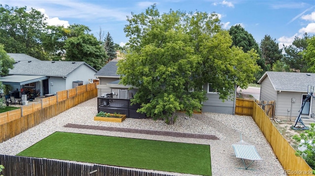 view of yard featuring a fenced backyard