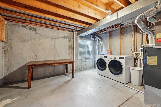 below grade area featuring washing machine and dryer