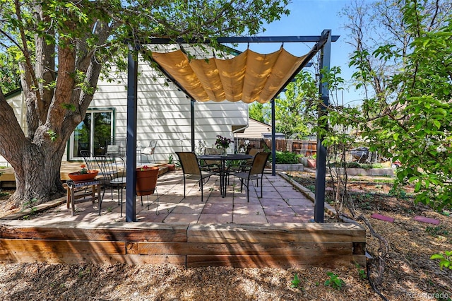 view of patio / terrace with fence and outdoor dining space