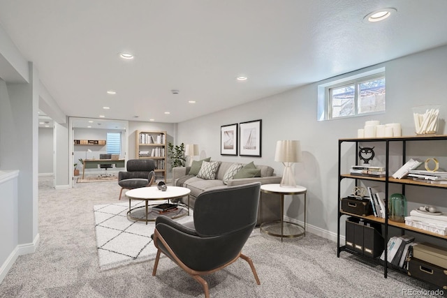 living room with recessed lighting, baseboards, and carpet floors