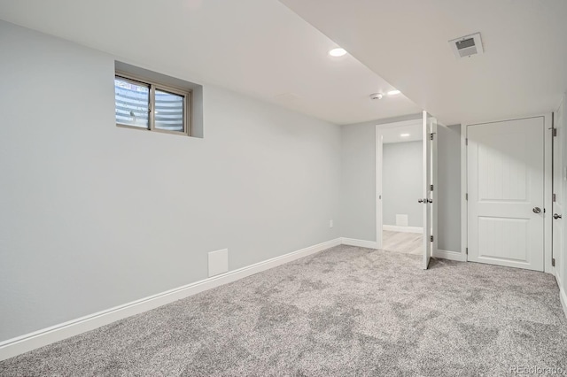 basement with recessed lighting, visible vents, carpet flooring, and baseboards