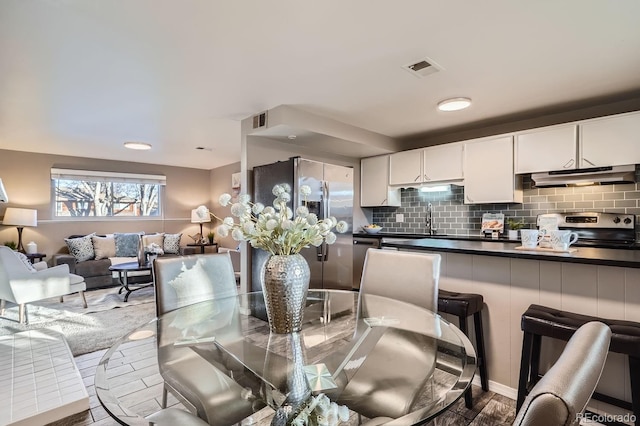 dining area with visible vents