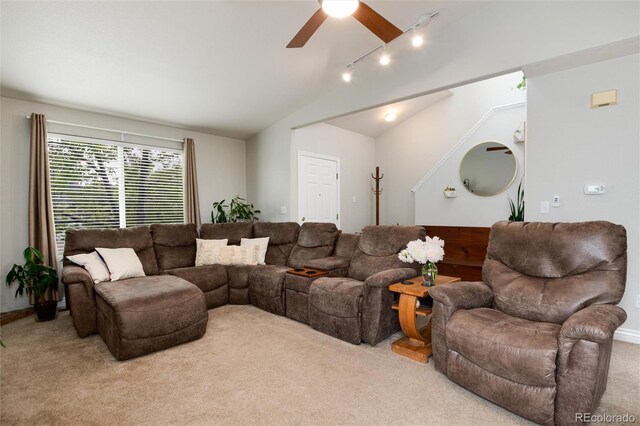 8129 Locust Dr, Littleton, CO 80125 - living room featuring carpet floors, vaulted ceiling, ceiling fan, and track lighting