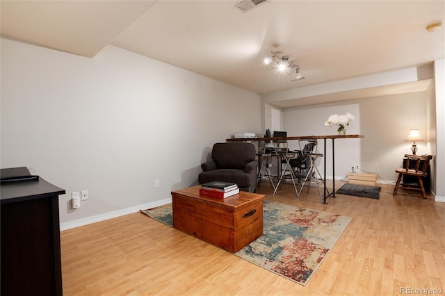 8129 Locust Dr, Littleton, CO 80125 - living room with wood finished floors and baseboards