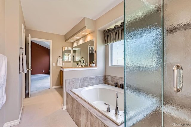 5305 W Lake Pl, Littleton, CO 80123 - bathroom featuring a garden tub and baseboards