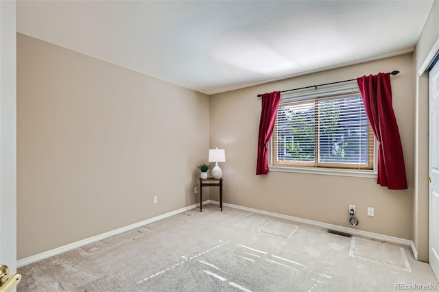 5305 W Lake Pl, Littleton, CO 80123 - carpeted empty room with baseboards