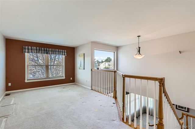 5305 W Lake Pl, Littleton, CO 80123 - spare room with baseboards and carpet