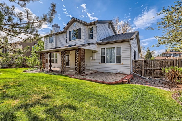 5305 W Lake Pl, Littleton, CO 80123 - rear view of property featuring a patio and a chimney