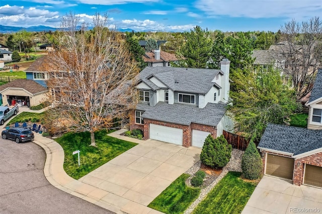5305 W Lake Pl, Littleton, CO 80123 - aerial perspective of suburban area with a mountain backdrop