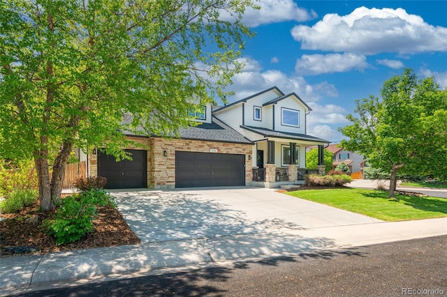 6488 Tilbury Ave, Firestone, CO 80504 - view of front of house with stone siding, covered porch, concrete driveway, and an attached garage