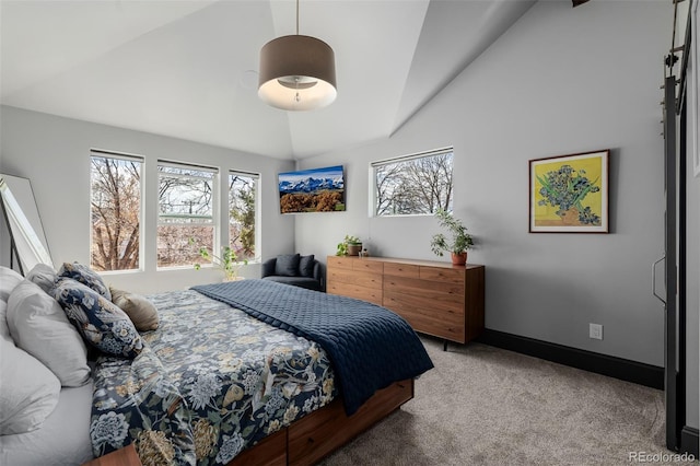 bedroom featuring vaulted ceiling, light colored carpet, and baseboards