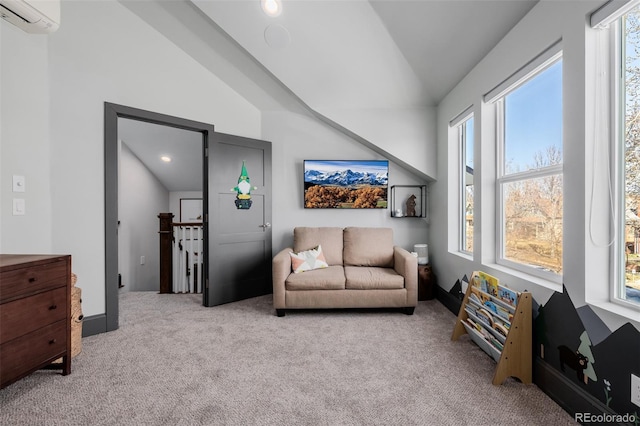 living area featuring carpet floors, an AC wall unit, an upstairs landing, and vaulted ceiling