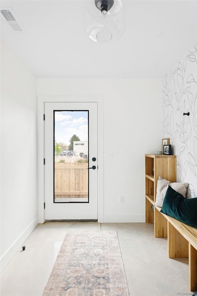 bedroom with baseboards and visible vents