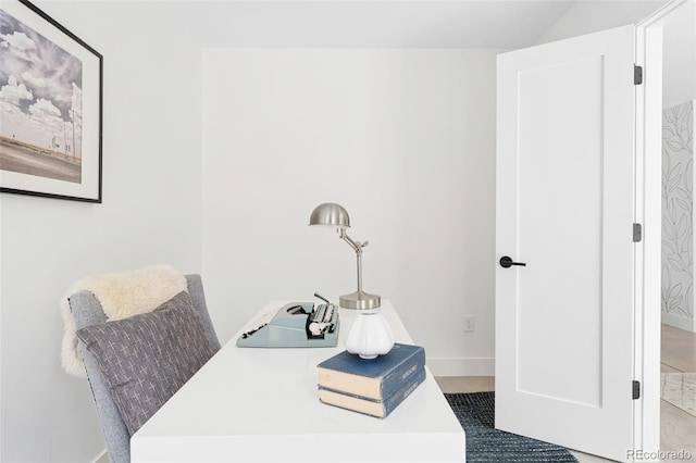 office area featuring baseboards
