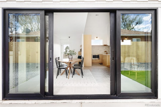 doorway to outside featuring plenty of natural light