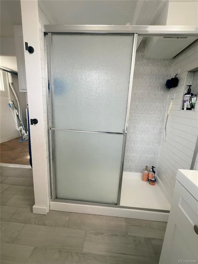 bathroom featuring a shower stall