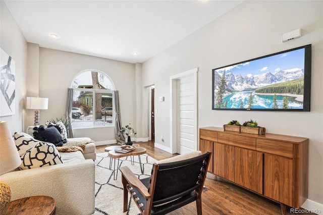 living room with light hardwood / wood-style flooring