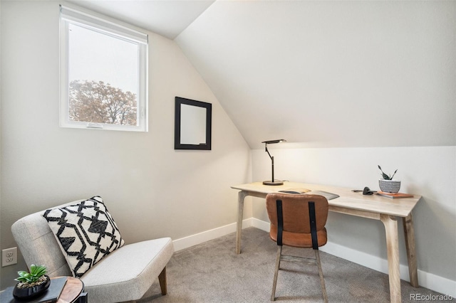 office area featuring carpet and vaulted ceiling