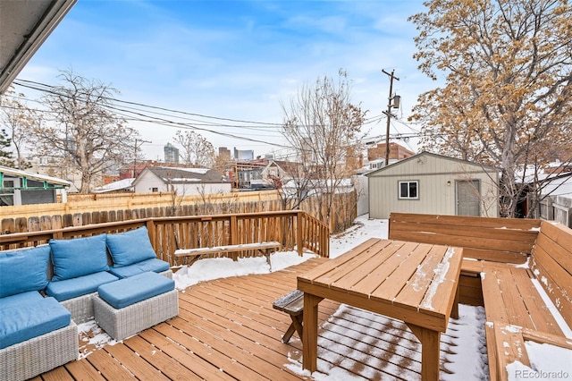 view of snow covered deck