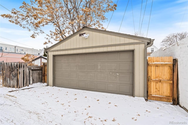 view of snow covered garage